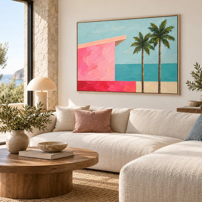 Coral Shore Pavilion above a cream sectional with blush cushions and a round wood table