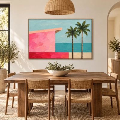 Coral Shore Pavilion above a dining table beneath a woven pendant with cane chairs