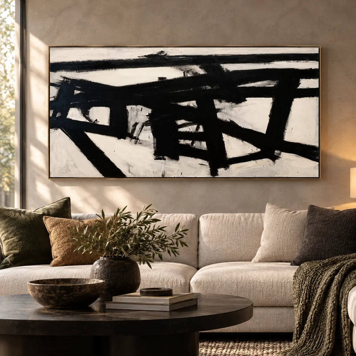 Crossing the Ivory Field: above an ivory sofa with a round dark table and green cushions