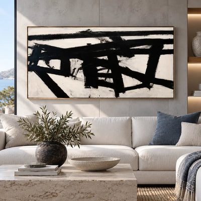 Crossing the Ivory Field: above a white sofa with a blue cushion and pale stone table