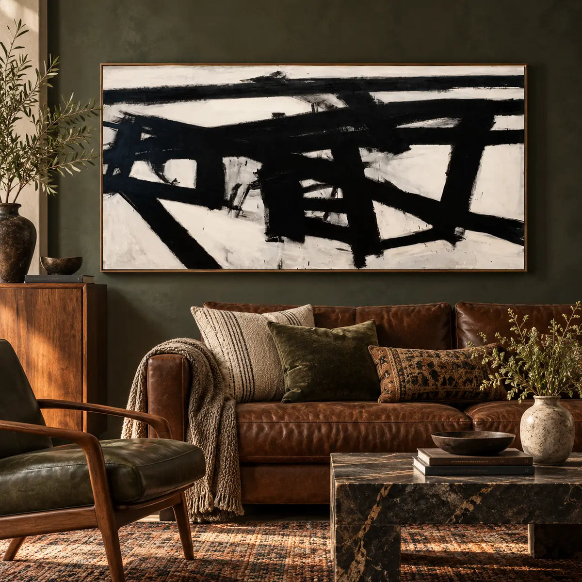 Crossing the Ivory Field: above a brown leather sofa against an olive wall