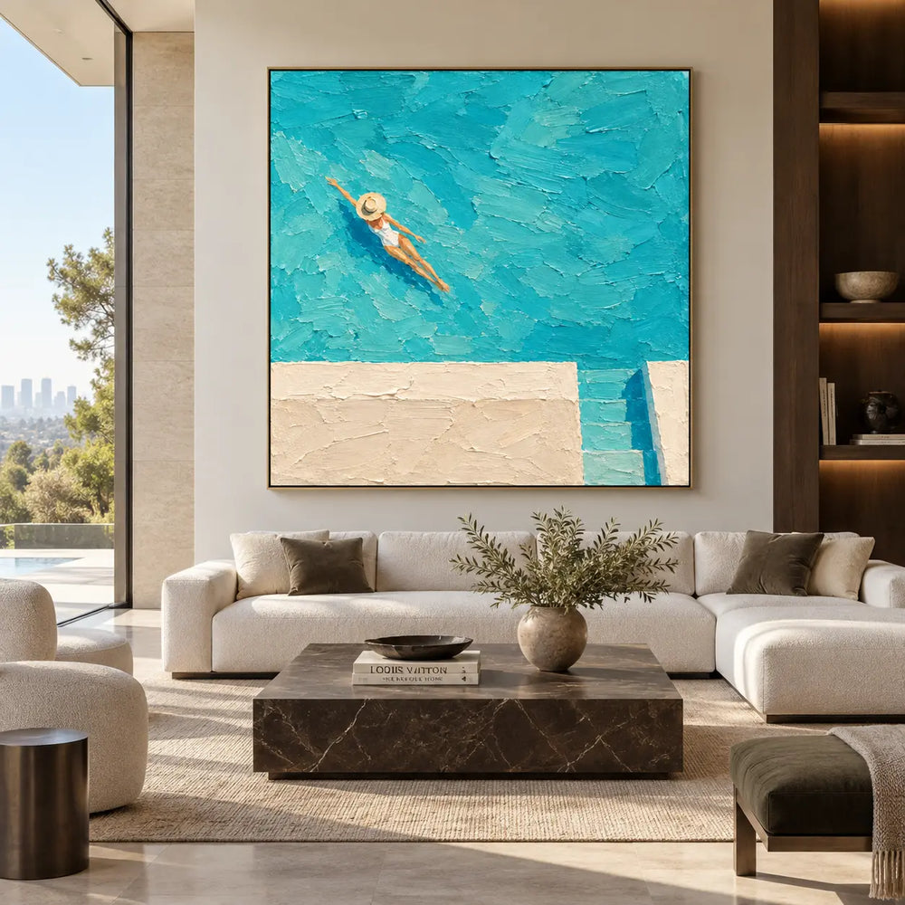Drift Above the Pool Steps: above a cream sectional and dark rectangular coffee table