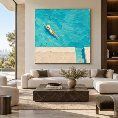 Drift Above the Pool Steps: above a cream sectional and dark rectangular coffee table