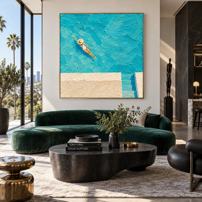 Drift Above the Pool Steps: above a deep green sofa with a circular veined stone table