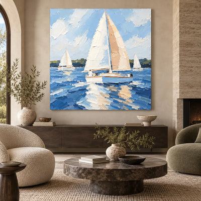 Full Sail in June above a dark wood console near a rounded chair and circular marble table