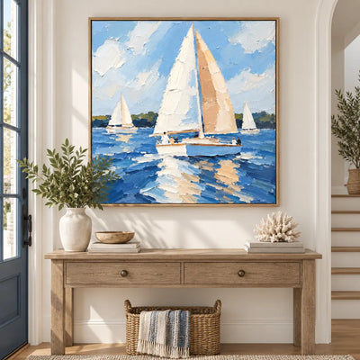 Full Sail in June above a light wood entry console with baskets and a striped throw