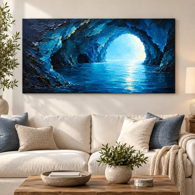 Inside the Blue Grotto: above a cream sofa with blue cushions and a rustic rectangular table