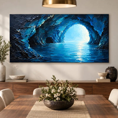 Inside the Blue Grotto: above a dining sideboard behind a wood table with white flowers