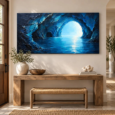 Inside the Blue Grotto: above an entry console and woven bench beside a glass paneled door