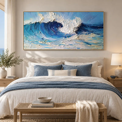 Inside the Turquoise Break: above a bed with navy cushions and a woven wood bench