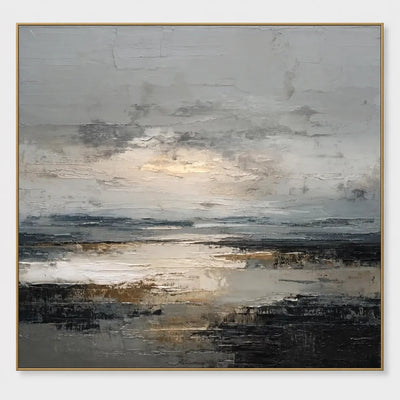Light Between the Tidal Rocks: A pale cloud opening reflects through water between dark foreground rocks