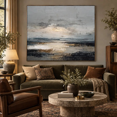Light Between the Tidal Rocks: above an olive sofa with a patterned cushion beside a leather chair