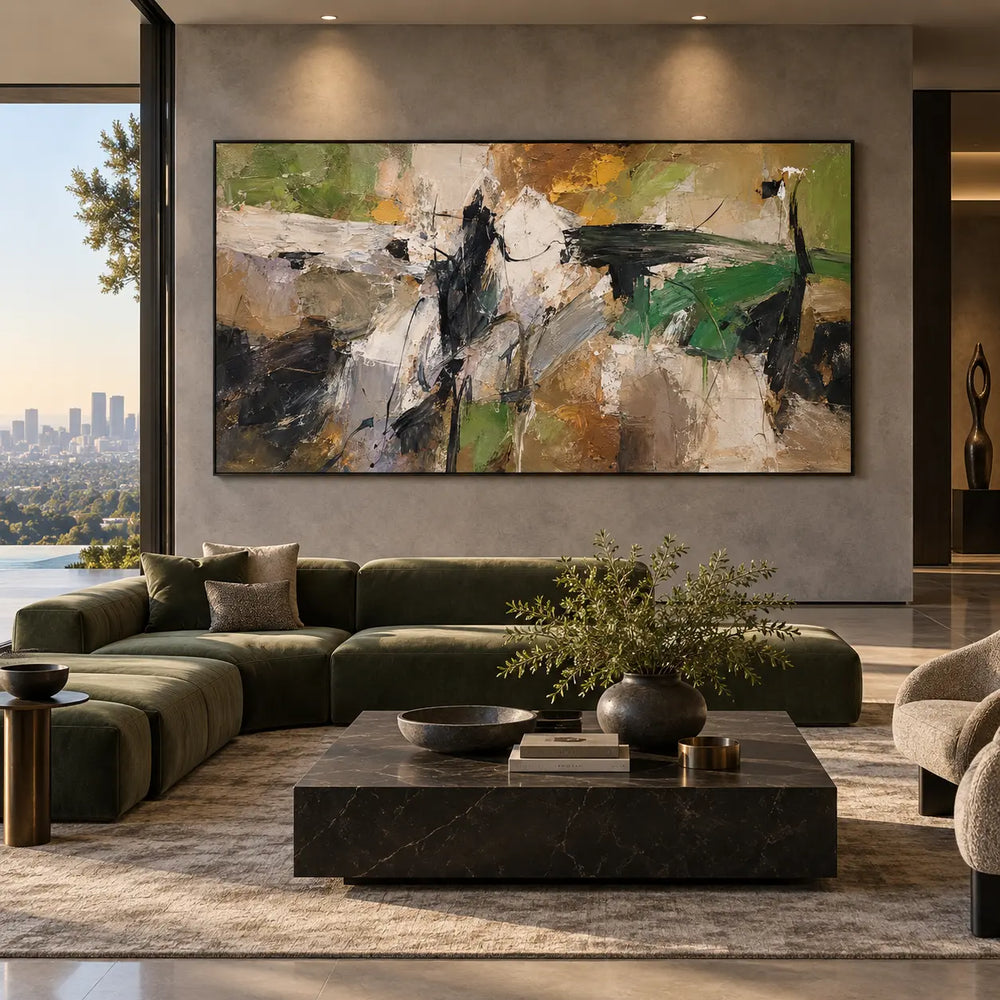 Olive Spanning the White Break: above a dark green sectional and rectangular marble table