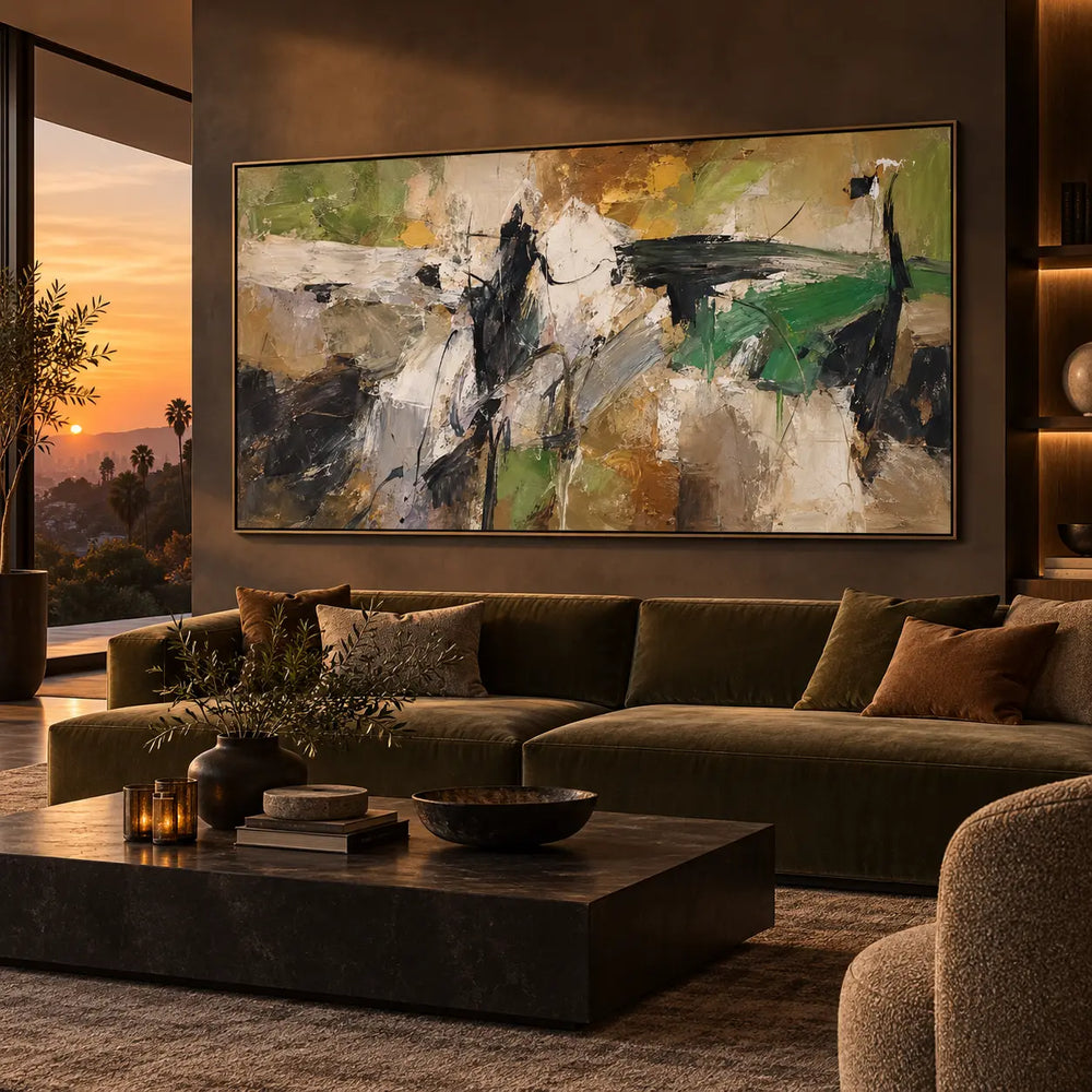 Olive Spanning the White Break: above a deep green sofa beside sunset glazing and amber cushions