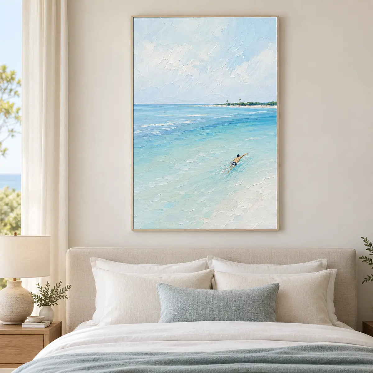 One Stroke Toward the Palms: above a white bed with a pale blue lumbar cushion