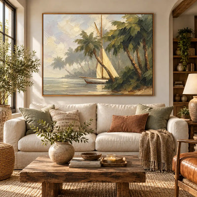 Palms at Anchor above a sofa with a rust cushion beside windows and open shelves
