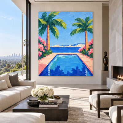 Palms Framing the Bay: above a pale sectional with a dark marble table and white flowers