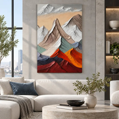 Peaks Above the Ember Range: above a white sectional with a blue cushion and pale stone table