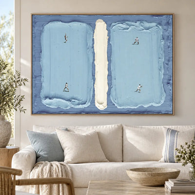 Courts in Parallel above an ivory sofa with pale blue cushions and a round wood table