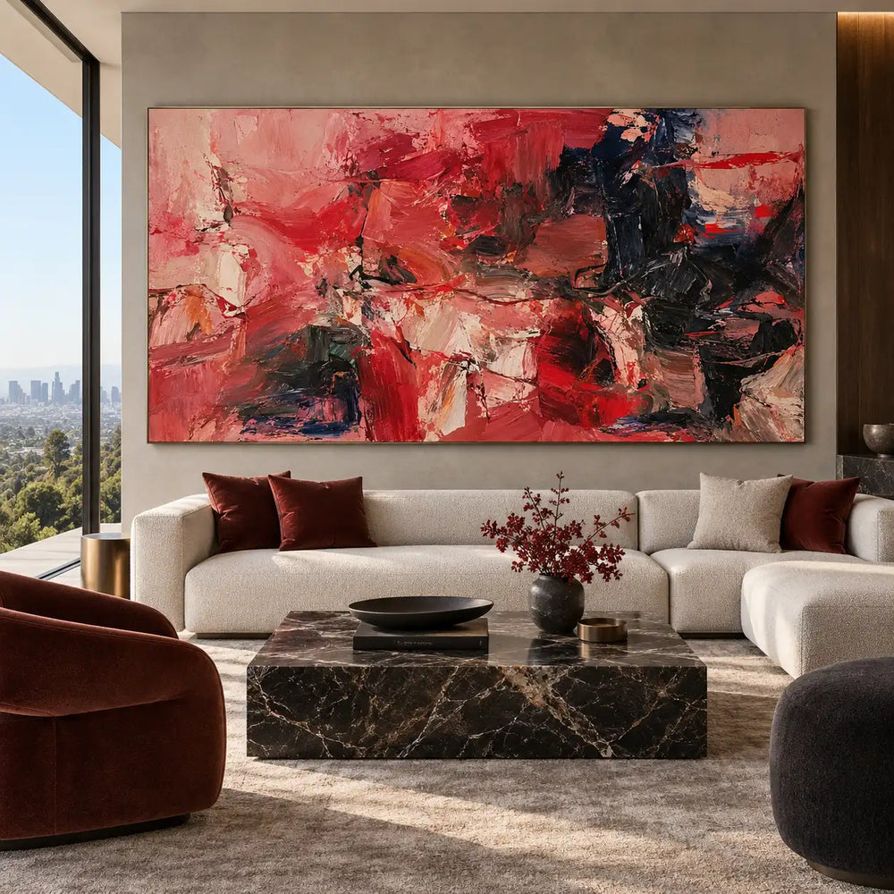 Red Fragments Around a Dark Knot: above a white sofa with burgundy cushions beside a red chair