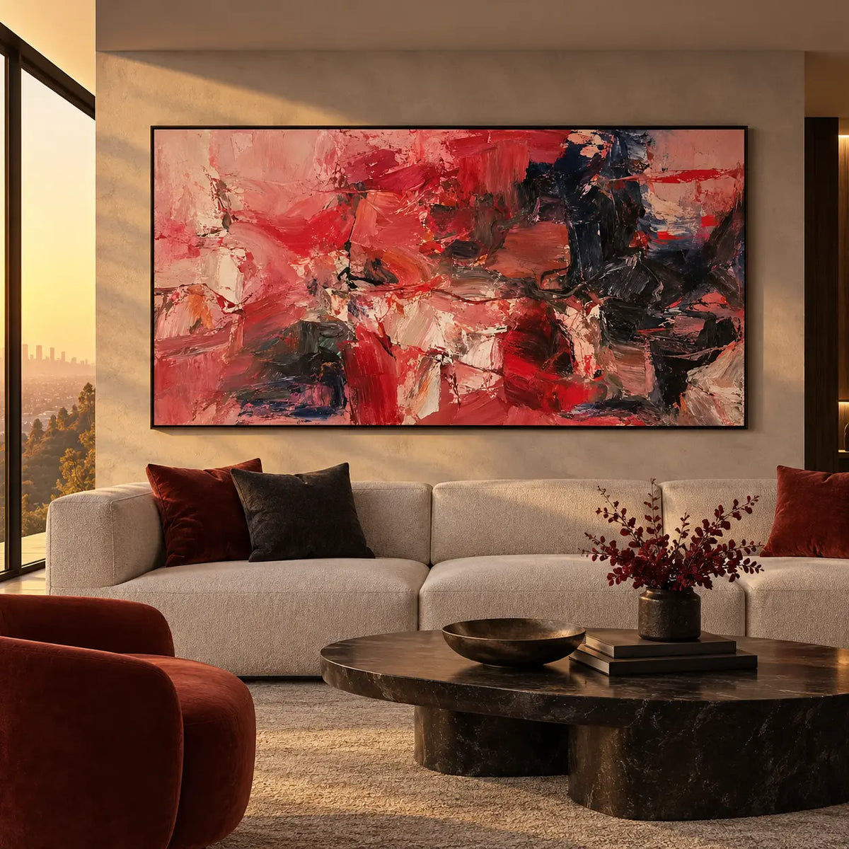 Red Fragments Around a Dark Knot: above a rounded white sofa beside warm sunset glazing