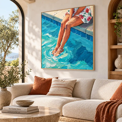 Ripples at Noon above a sofa with rust cushions beside an arched opening