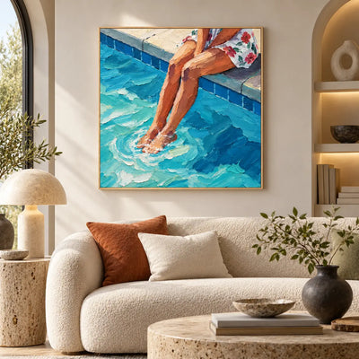 Ripples at Noon above a curved ivory sofa near illuminated display niches