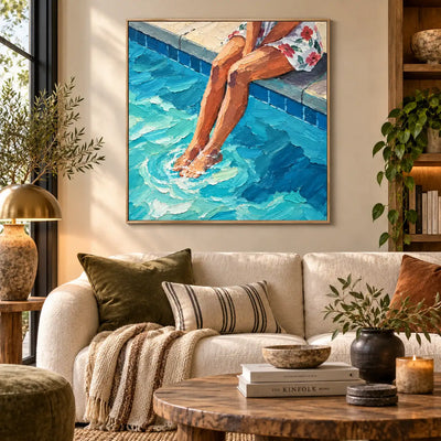 Ripples at Noon above a sofa with olive and striped cushions beside a brass lamp