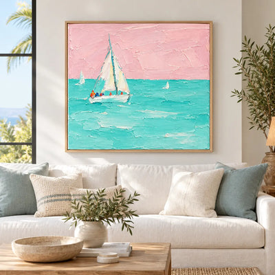 Rose Sky Regatta above a white sofa beside a coastal window and pale blue cushion