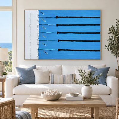 Six Lanes from the Edge: above a white sofa with blue cushions and a light wood table