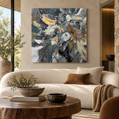 Slate in Motion: above a curved cream sofa with a round wooden table