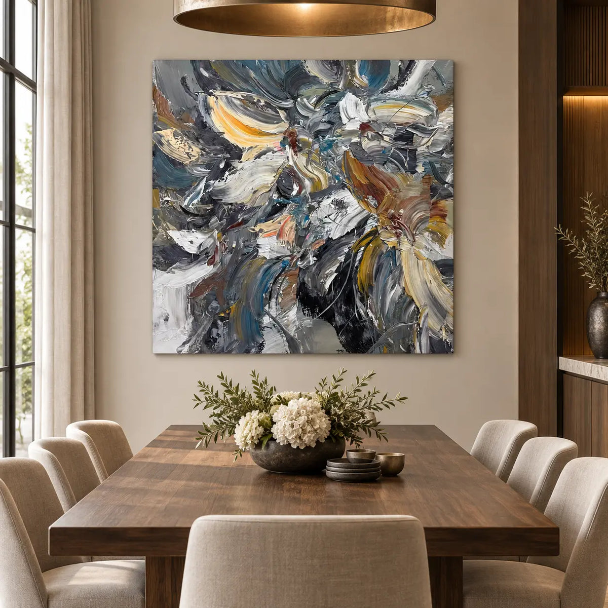 Slate in Motion: above a wooden dining table with white flowers and a brass pendant