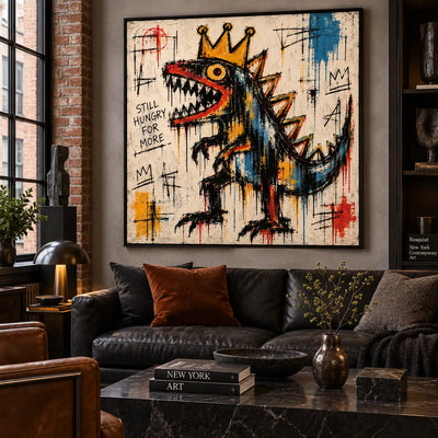 Still Hungry for a Crown: artwork above a black leather sofa beside brickwork and a dark marble table