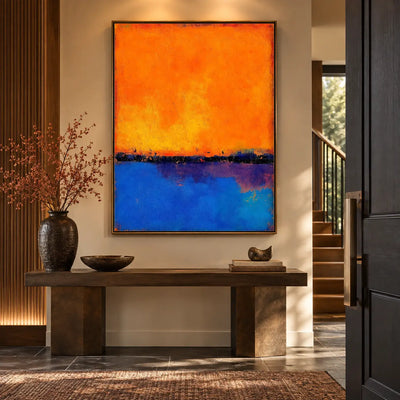 Tangerine over Ultramarine: above a dark console beside a slatted wooden wall and stairs