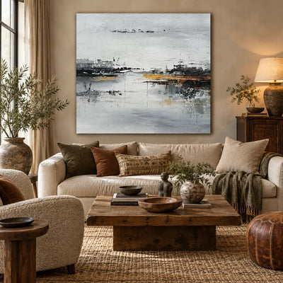 The Amber Quay: above a cream sofa and rustic table with a leather pouf