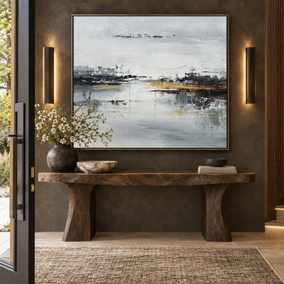 The Amber Quay: above a sculptural brown stone console between cylindrical wall lights