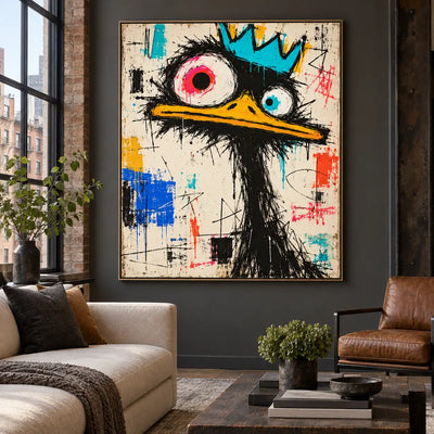 The Bird with Unequal Eyes: artwork above a cream sofa beside an exposed brick window and brown leather chair