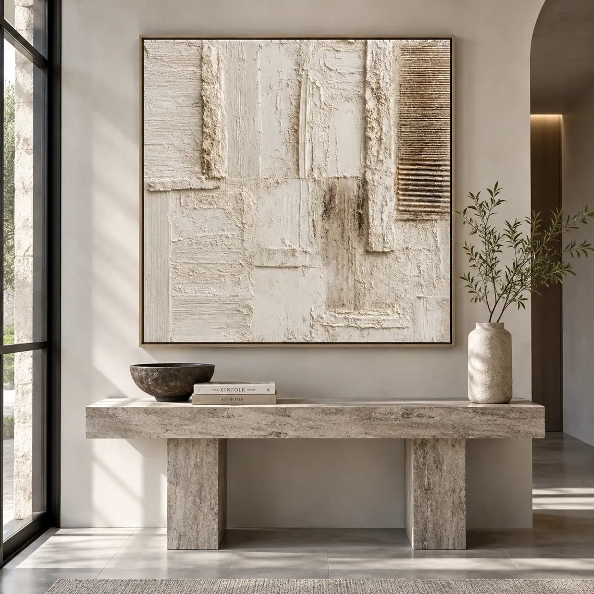 The Chalkwork Grid: above a pale stone entry console beside glass doors