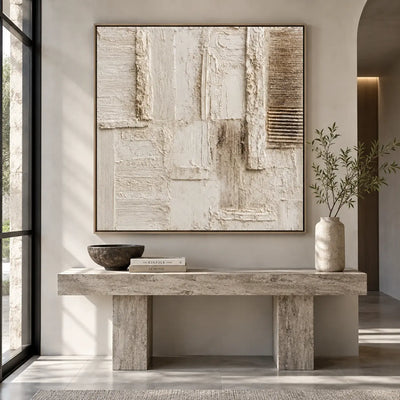 The Chalkwork Grid: above a pale stone entry console beside glass doors