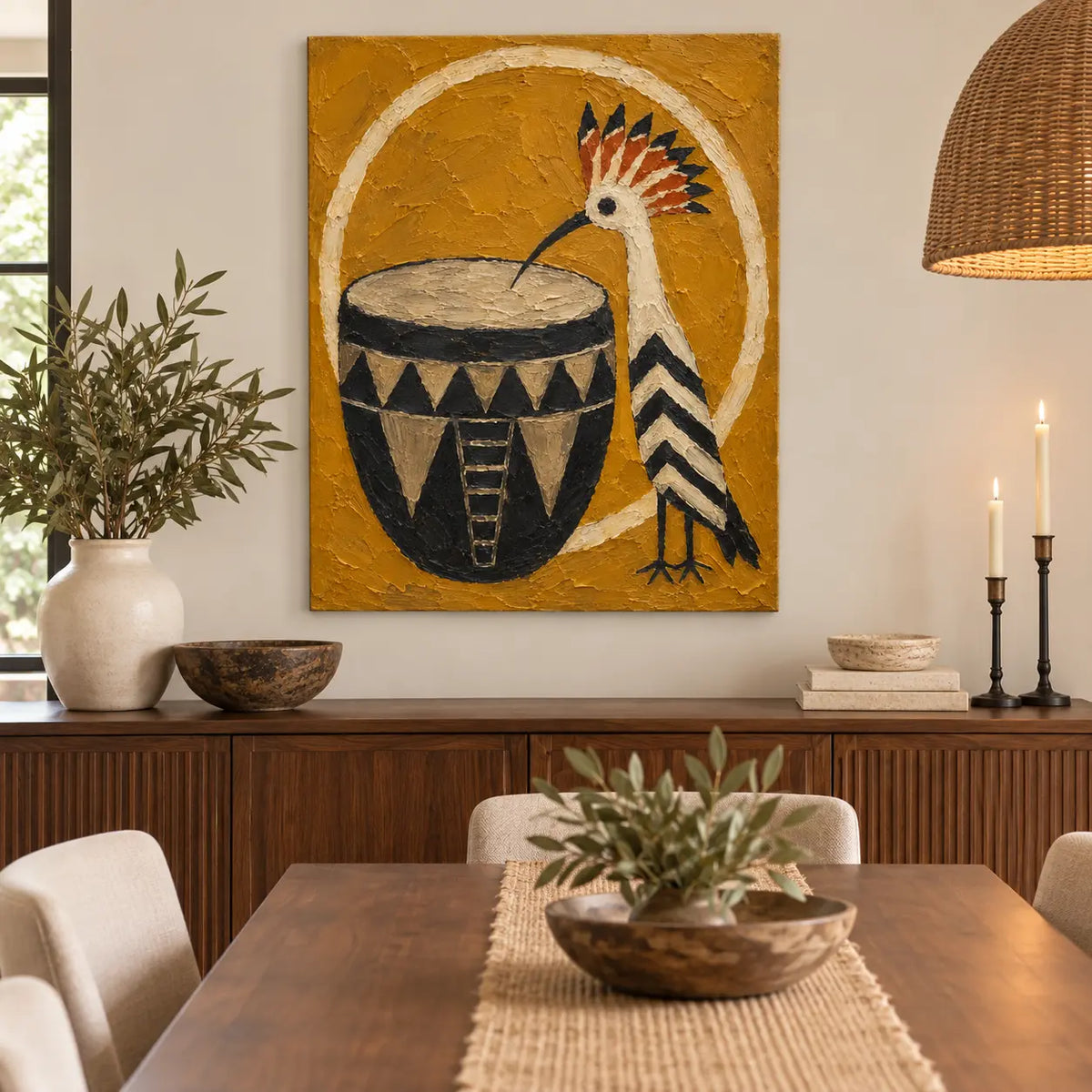 The Crested Drummer: above a dining sideboard behind a table with a woven runner