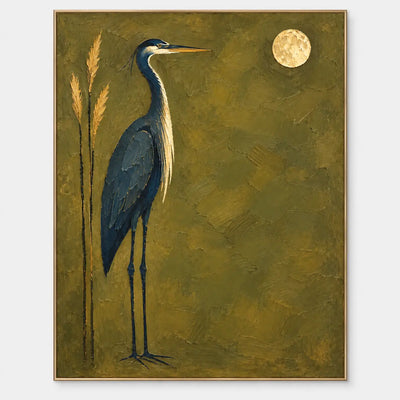 The Heron’s Golden Hour: A tall blue heron beside golden reeds and a pale round moon on an olive ground
