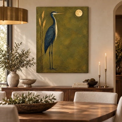 The Heron’s Golden Hour: above a dining sideboard with slender brass candles