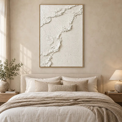 The Ivory Ascent: above a linen bed with layered neutral pillows and wood bedside tables