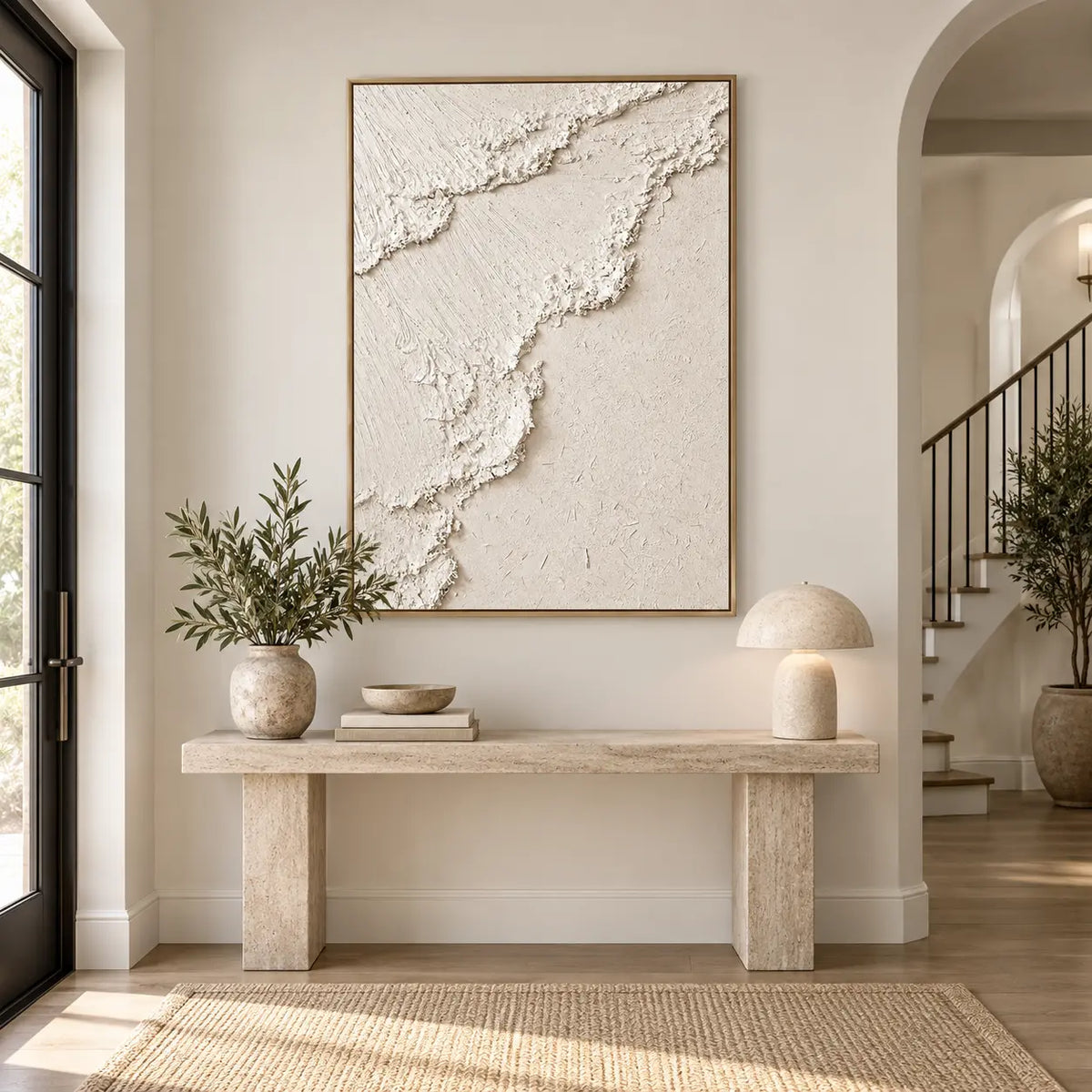 The Ivory Ascent: above a pale stone console beside an arched staircase opening