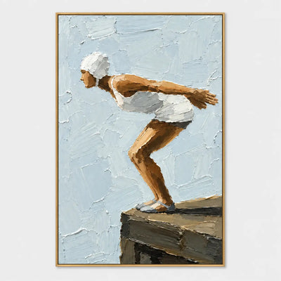 The Moment Before: A swimmer in white crouching at the edge of a dark wooden platform