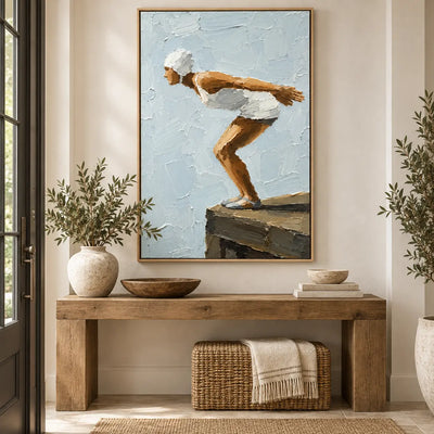 The Moment Before above an entry console with bowls and a woven stool