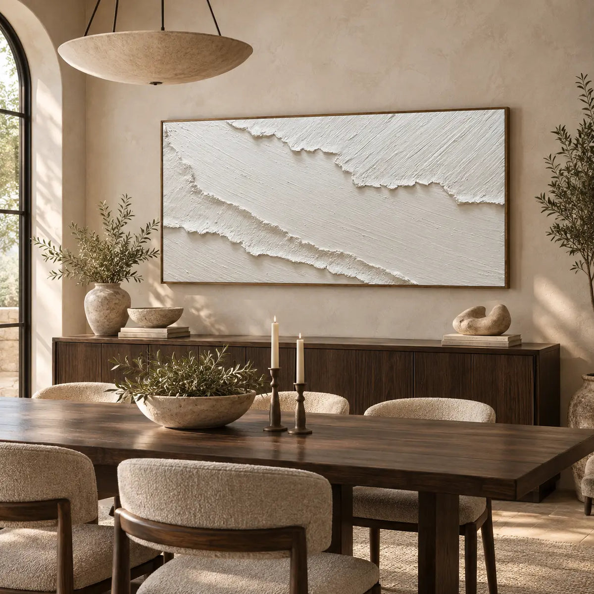 The Pale Divide: behind a wood dining table with candles and a broad bowl pendant