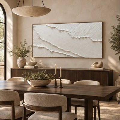 The Pale Divide: behind a wood dining table with candles and a broad bowl pendant