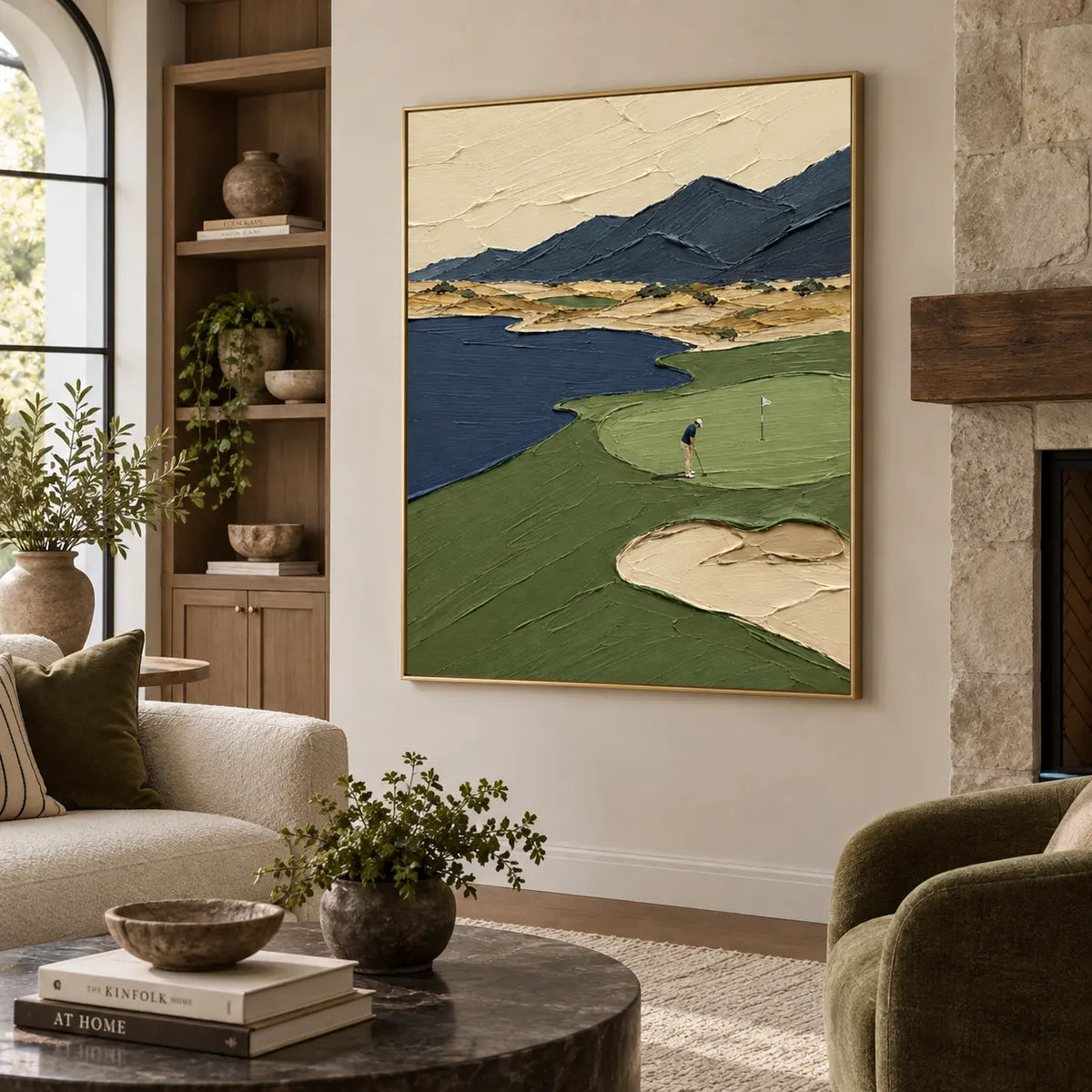 The Putt Beneath Blue Peaks: beside a stone fireplace between cream sofa and green armchair
