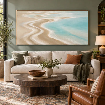 The Shore Draws a Curve: framed on an olive wall above a cream sofa with rust and green cushions